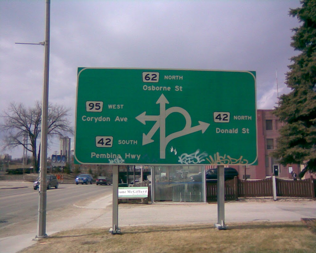 Road sign at intersection